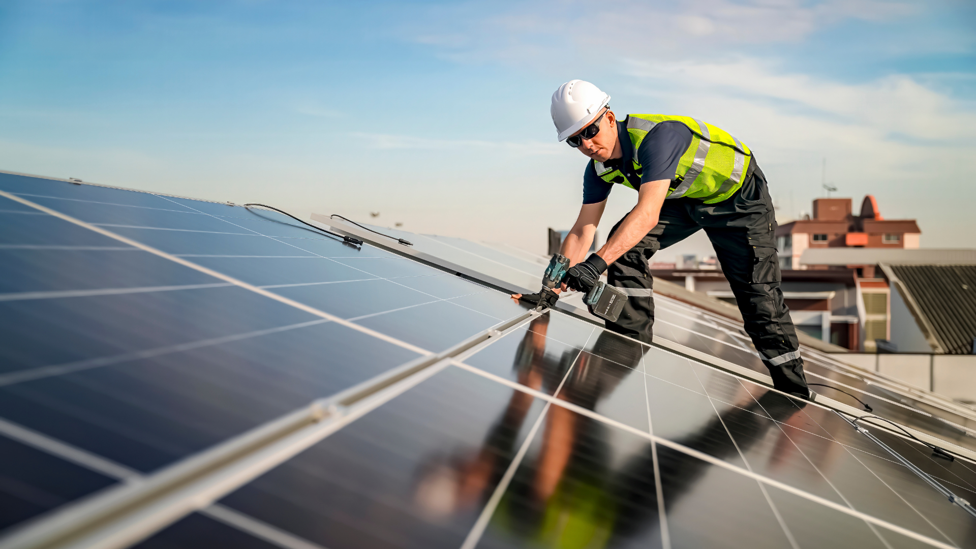 Commercial solar engineer installing rooftop panels